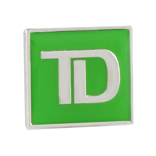 Picture of a TD company logo hard enamel pin