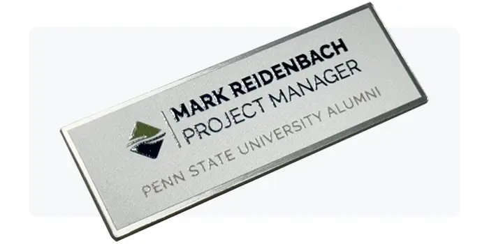 Example of a name tag with embossed (raised) text.